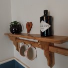 Rustic Elegance: Reclaimed Kitchen Shelf & Cup Hook Board